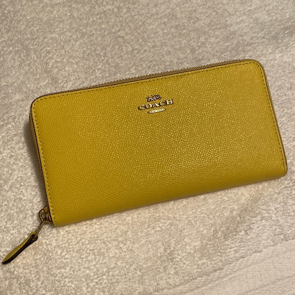 Coach Handbags - Coach Yellow Wallet